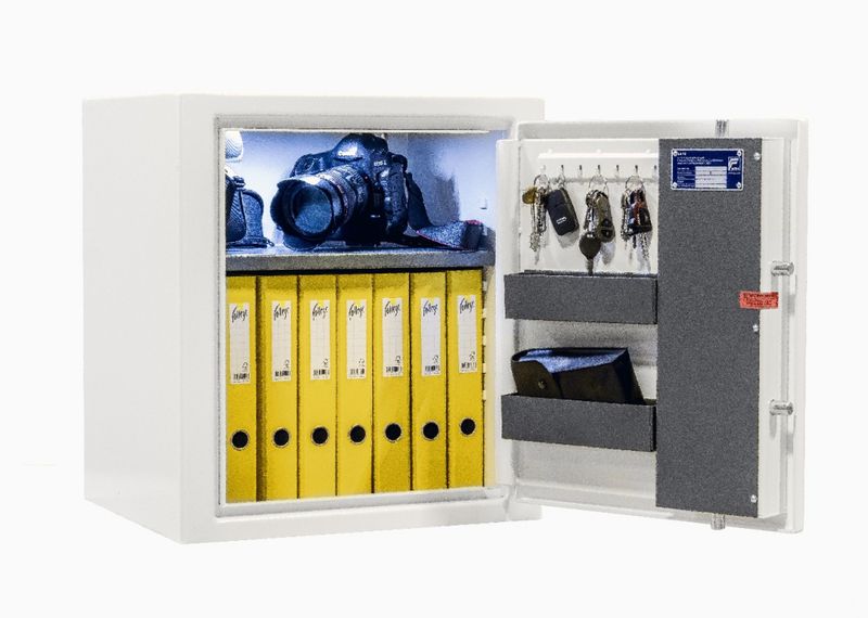 Liten, FG-godkjent safe for hjemmet med en hylle og 2 bokser. 